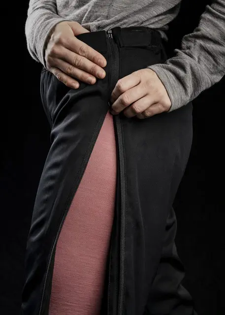 Heat Experience Heated Knee Pants S Slitstark Svart värmebyxa med dragkedjor 