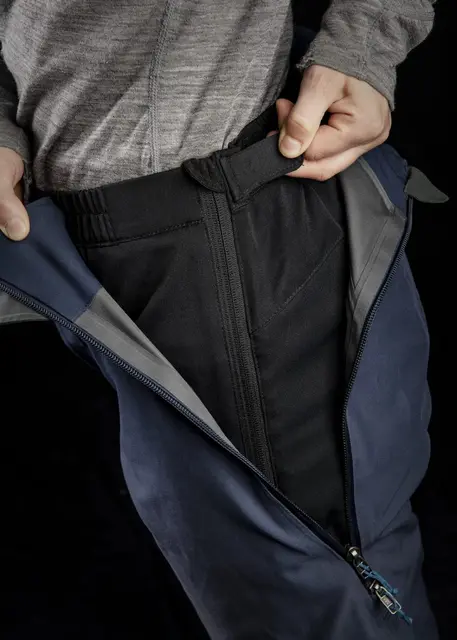 Heat Experience Heated Knee Pants S Slitstark Svart värmebyxa med dragkedjor 