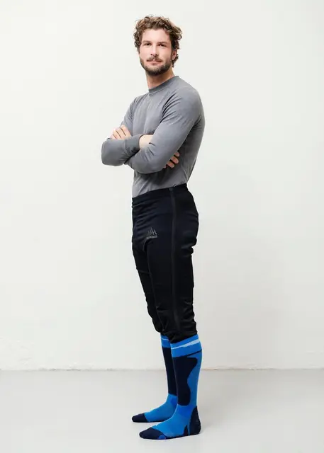 Heat Experience Heated Knee Pants S Slitstark Svart värmebyxa med dragkedjor 