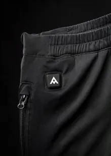 Heat Experience Heated Knee Pants S Slitstark Svart värmebyxa med dragkedjor 