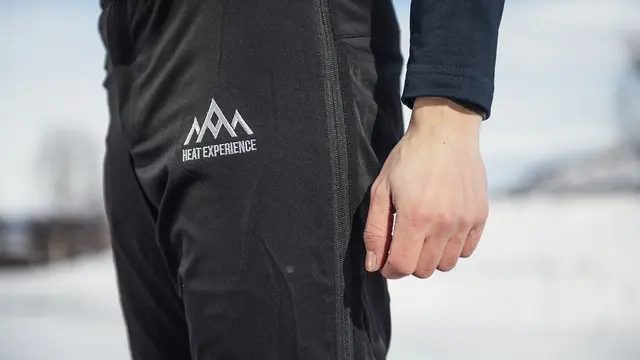 Heat Experience Heated Knee Pants S Slitstark Svart värmebyxa med dragkedjor 