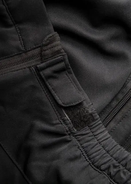 Heat Experience Heated Knee Pants S Slitstark Svart värmebyxa med dragkedjor 